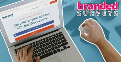branded surveys website on laptop screen next to branded surveys logo