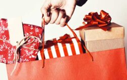 hand holding bag of presents
