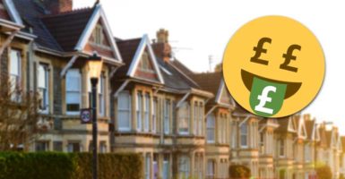 Money face emoji with Bristol houses