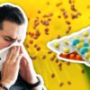 sneezing man hayfever pills