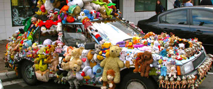 car covered in teddies