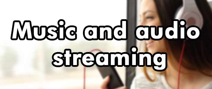 text music and audio streaming written over woman with headphones