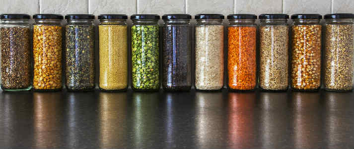 row of herbs spices seasoning kitchen cooking