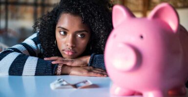 Woman looking worried about money