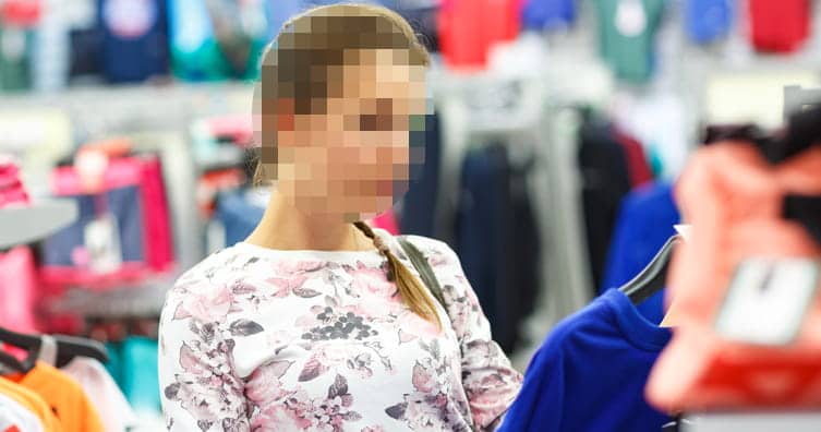 woman shopping for clothes with blurred face